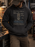 Model wearing a Charcoal Heather Glitch hoodie beside a workbench, with a tube schematic and flicker graph above the pouch pocket.