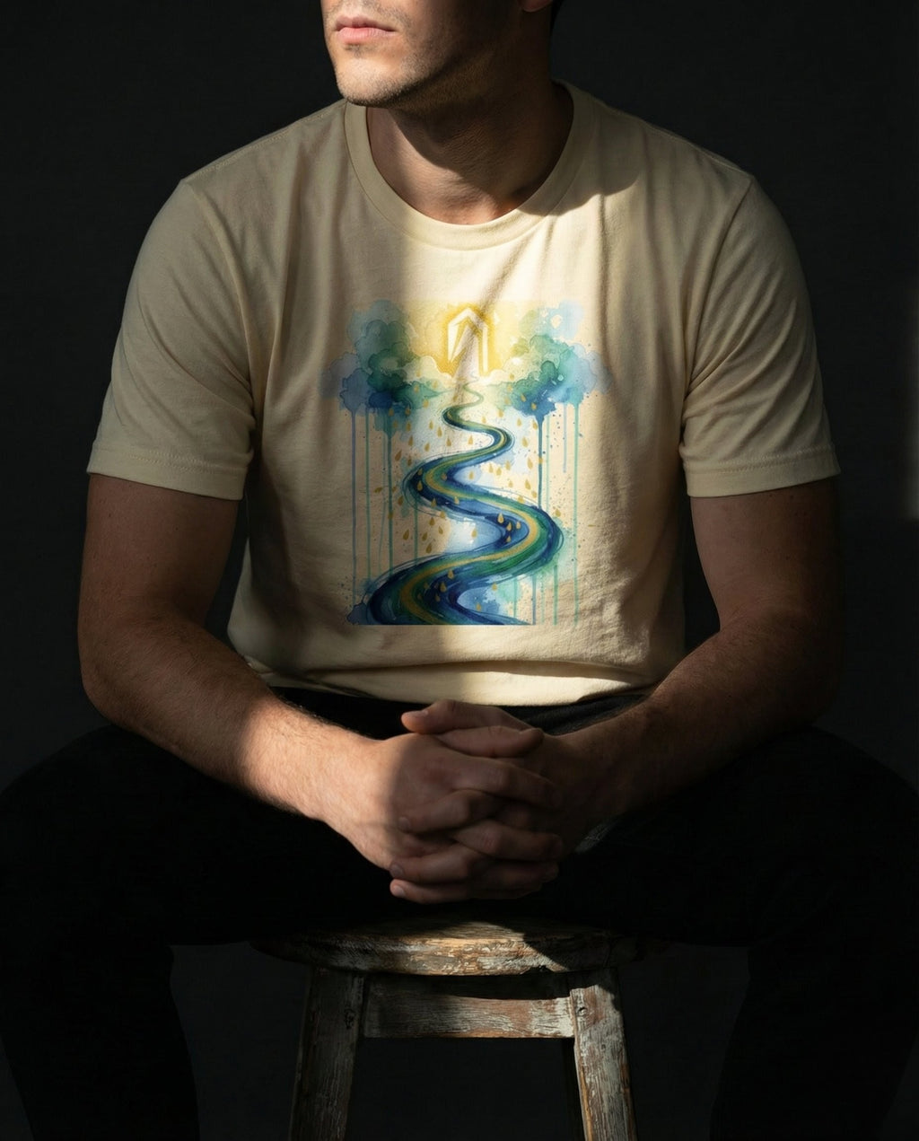 Selah Supply Co. The Impossible Tee in Solid White Blend. Model wearing a scripture-based tee illustrating the 'physics of faith' from Hebrews 11:6. The vibrant artwork features an immovable golden reality and a path flowing through uncertainty. Premium men's faith-based streetwear.
