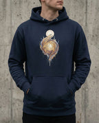 Model wearing the Navy Blazer Edify Hoodie with interwoven golden figures rising toward a light.