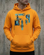 Model wearing the Team Gold Insolvent Hoodie with geometric creditor and debtor figures, stacked gold and tangled black lines.