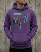 Model wearing the Purple Insolvent Hoodie with geometric creditor and debtor figures, stacked gold and tangled black lines.