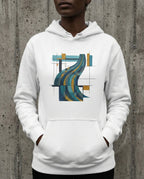 Model wearing the White Many Waters Hoodie with flowing blue, teal and gold bands crossing a black geometric grid on the front.
