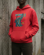 Model wearing the Team Red Many Waters Hoodie with flowing blue, teal and gold bands crossing a black geometric grid on the front.