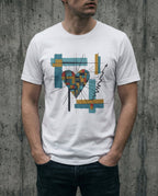 Model wearing the white Search Me Tee with a geometric heart crossed by black lines, colored blocks and an upward arrow.