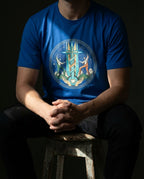 Model wearing the True Royal Secret Tee with circular cross, winding helix, figures and heart artwork on the front.