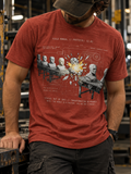 Front view of a standing model in a workshop, wearing a heather clay T-shirt with conveyor belts carrying gray busts around a bright yellow burst, overlaid with technical linework centered on the front.