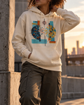 Model wearing the Bone Output Hoodie with a divided dark and golden sphere with red lightning, a branch and blue flowing lines.