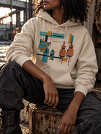 Model seated wearing the Oatmeal Heather Expansion Hoodie with a geometric cloth patch, two wineskins and dark drips within a colored grid.