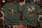 Olive green T-shirts laid front and back on maps; the front shows gloved hands passing torn cloth, and the back shows a circular stormy landscape labeled THE CARMEL BLACKOUT.