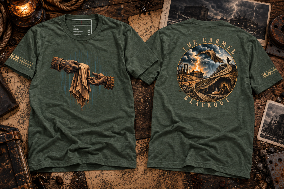 Olive green T-shirts laid front and back on maps; the front shows gloved hands passing torn cloth, and the back shows a circular stormy landscape labeled THE CARMEL BLACKOUT.